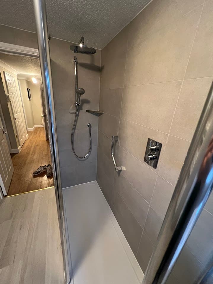 Sandstone & Mosaic Shower Room detail