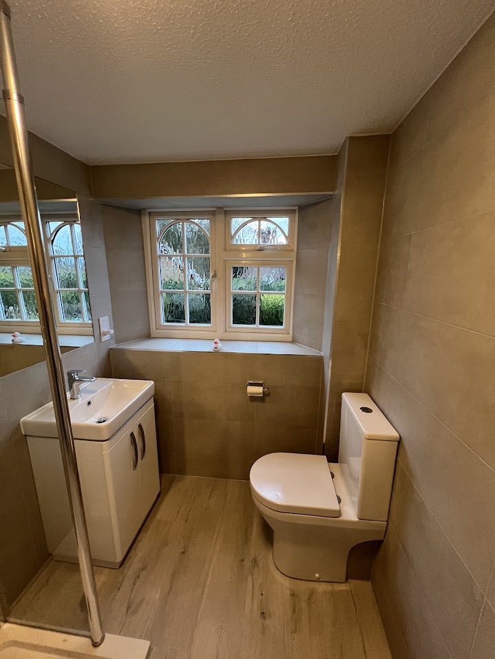 Sandstone & Mosaic Shower Room